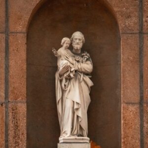 a statue of a woman holding a child