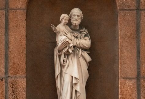 a statue of a woman holding a child